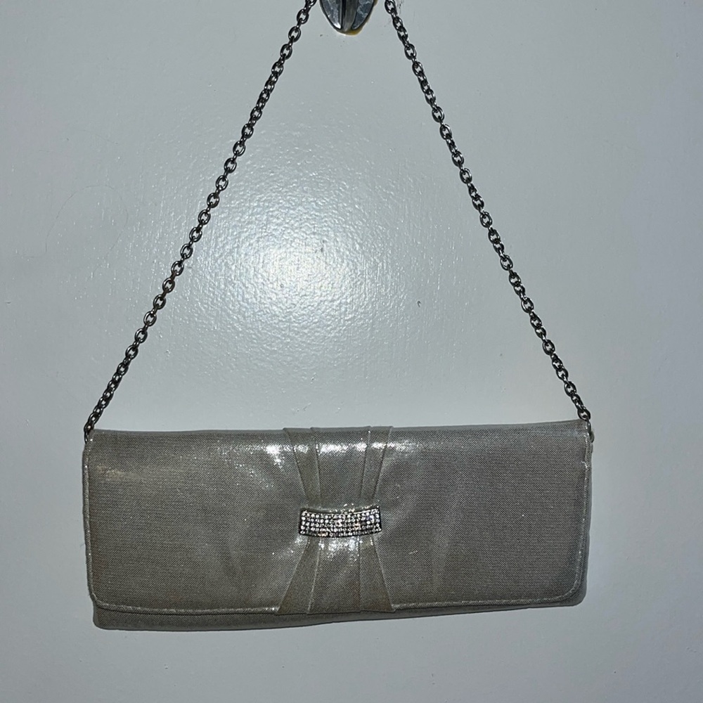 Silver clutch used once